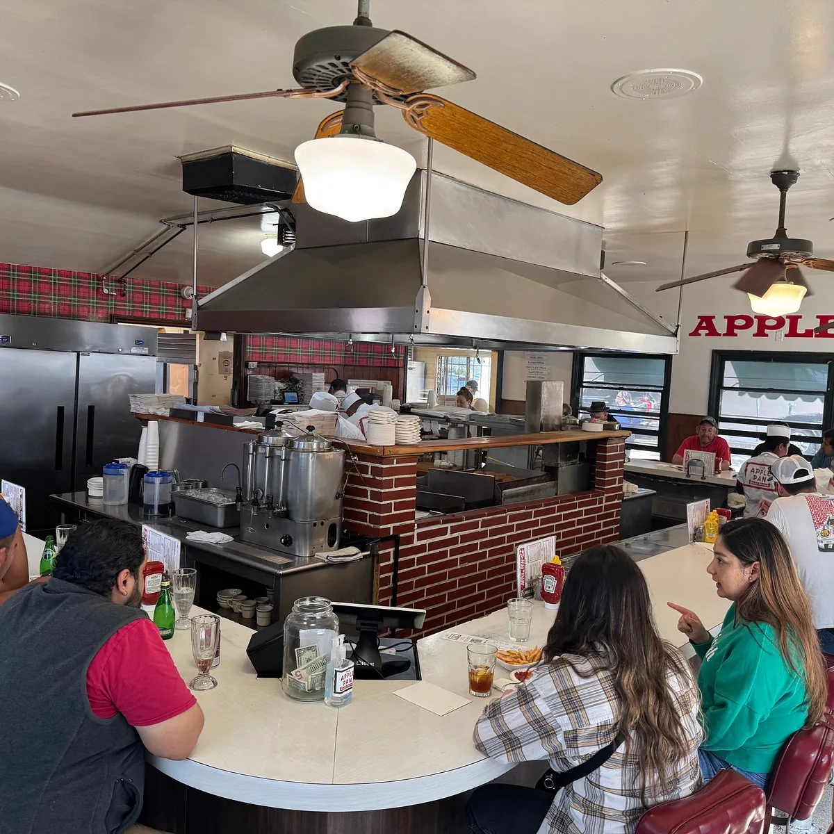 Historic U-shaped burger counter at The Apple Pan
