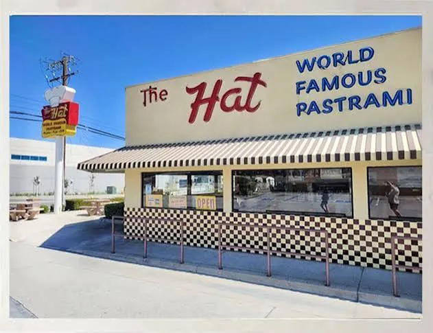 The Hat's original Alhambra stand and sign